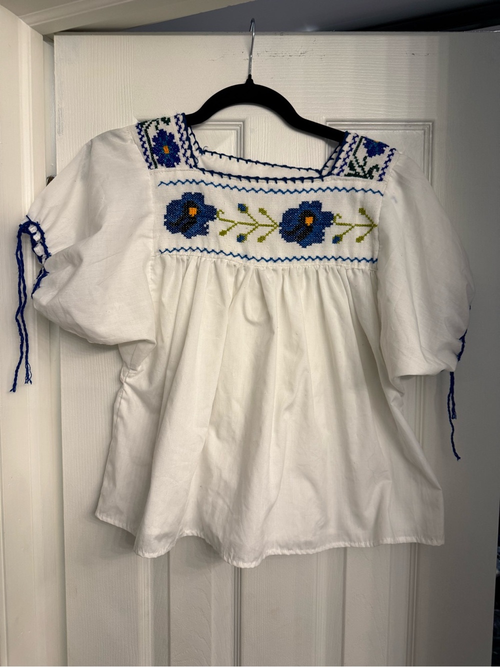 Hand-Embroidered White Peasant Top with Blue Floral Detail